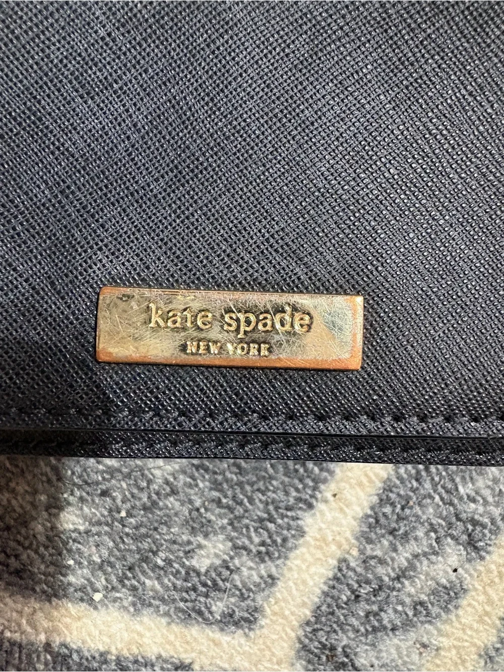 kate spade Black Textured Leather Crossbody with Gold Plaque